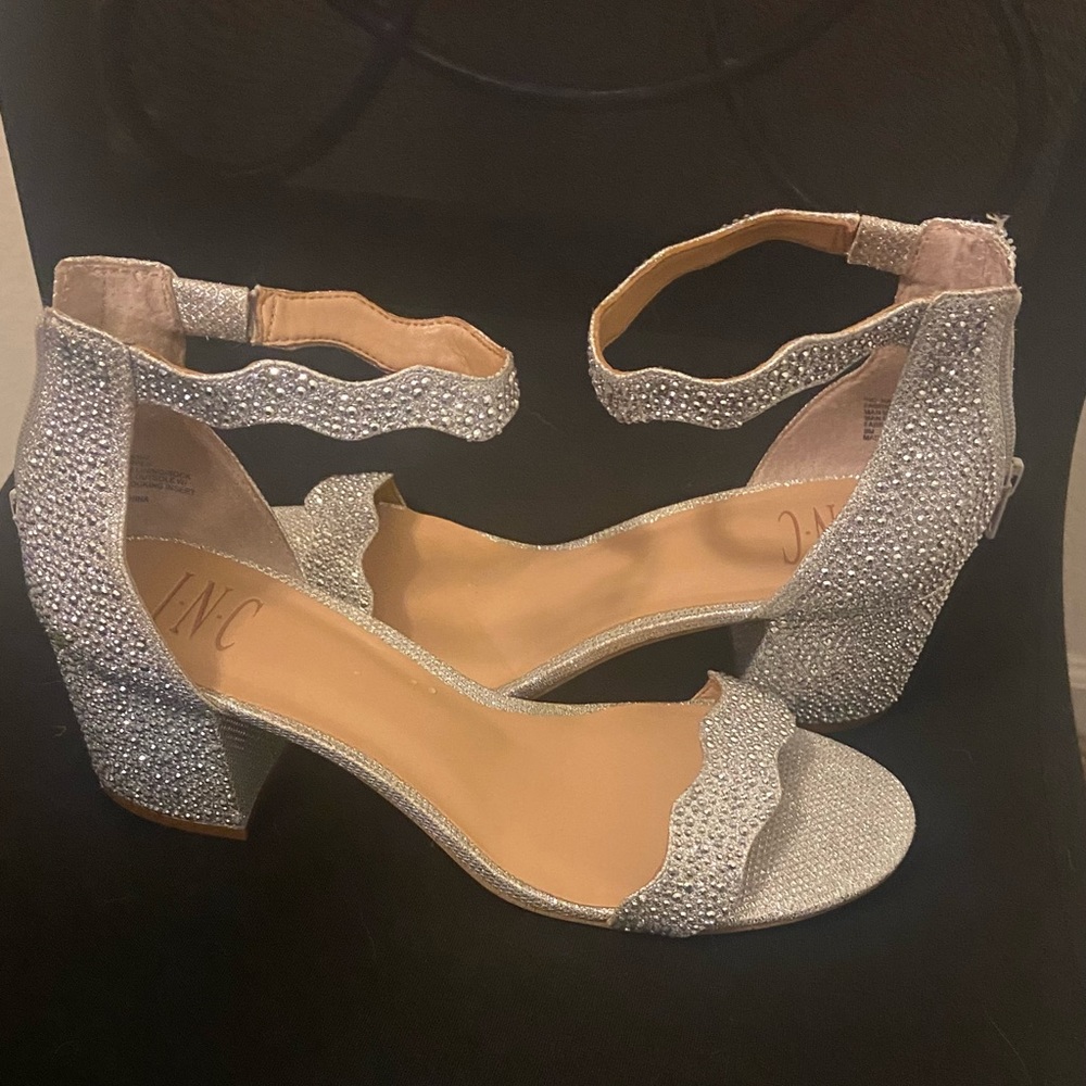 Silver crystal shoes with 2 inch block heel. Zips in the back.